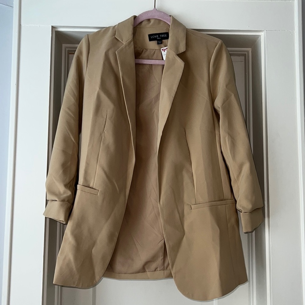 Tan blazer. Never worn - great condition.